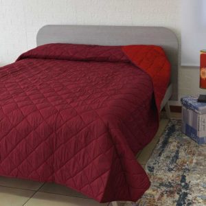 Trapuntino matrimoniale indicolor rosso/bordo ambientato